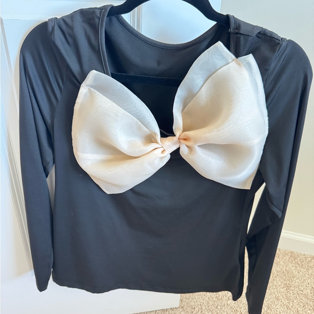 Elegant Black Top with Cream Bow